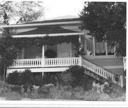 Hip roof cottage with Queen Anne details in the Raup Addition, at 211 Florence Avenue, Sebastopol, California, 1993