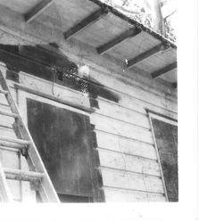 Burbank cottage before renovations--ladder under eves at front door