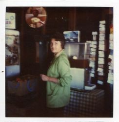 Marcia Hallberg at the Hallberg Apple Farm roadside stand, 1982