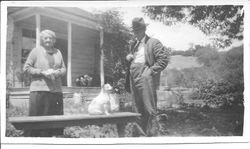 William and Leona Rosebrook and their dog Topsy by their farmhouse on Mill Station Road in Sebastopol