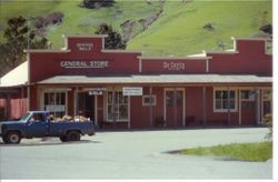Storefronts in Duncans Mills, California, for the General Store and De Carly store, about 1983