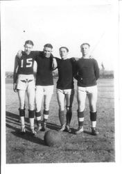 Four unidentified Analy High School athletes in uniform, possibly basketball or a form of soccer, 1924