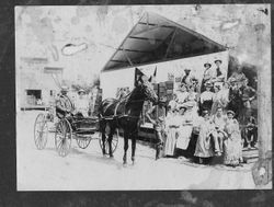 William Newton Shelley in a horse drawn cart outside a packinghouse, about 1915