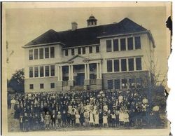 Sebastopol Grammar School with assembled teachers and student body in front of the school sometime after 1910