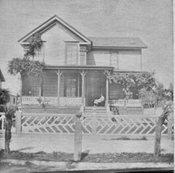 Mary Allen on the front porch of the Otis and Harriet Allen home at 1033 4th Street in Santa Rosa, California