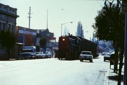 Southern Pacific train down main in the 100 block of South Main Street, Sebastopol, California, 1971