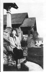 Bunni Cornelia E. Myers seated on front steps of house on Bodega Avenue