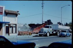 Demolition of the H. Reynaud Buiding that was former location of Joe's Budget Shop at the corner of South Main and Burnett Street, Sebastopol, California, 1979