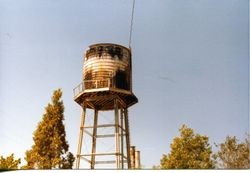 Water tower and tank at O. A. Hallberg & Sons cannery, September, 1979