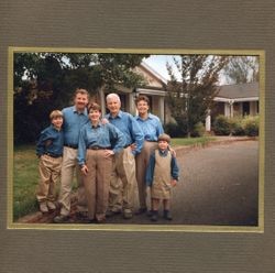 Harvey Henningsen photo of the Hallberg family taken in their driveway at 2597 Gravenstein Highway North, Sebastopol, California, November 1999