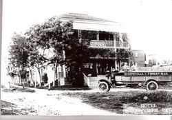 Electric Hotel, Forestville, Proprietor Clifford McConnell with Russell's Auto Stage parked in front, about 1910