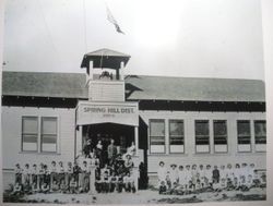 Students and teachers lined up on either side of the front entrance of Spring Hill School on Spring Hill School Road, Sebastopol, about 1914