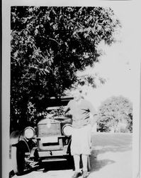 Volney Thomas Ballou, 1920s in front of a car wearing nickers and a sweater