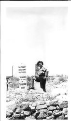 Bunni Streckfus posing in shorts at Boot Hill Cemetery in Tombstone, Arizona April 27, 1949