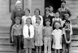 Hall School students standing on the steps of their school, June 1928