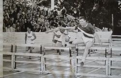 Analy High School Tigers track team, 1950--Analy hurdler Bill Scheidecker and an unidentified foot race