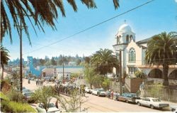 Apple Blossom Festival parade in front of the First Methodist Church, 500 North Main Street, Sebastopol, California, 1960s