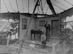 Gravenstein Apple Show display by the town of Graton and illustrates the ditty "A diller a dollar a ten o'clock hour, What made you come so soon? You used to come at 10 o'clock, but now you come at noon"