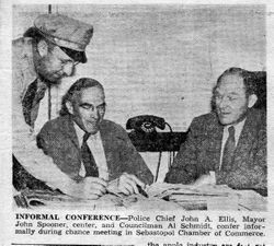 Sebastopol Police Chief John A. Ellis, Mayor John Spooner and Councilman Al Schmidt meet at Sebastopol Chamber of Commerce, July 1948