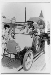 Glen and Betty Gulick ride in a 1915 Ford in the 1959 Gala Days Parade in Sebastopol