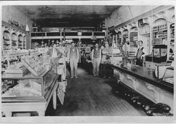 Five men in the interior of unidentified general store on Main Street Sebastopol, about 1900