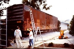 Pacific Fruit Express boxcar being refurbished and sand blasted for the West County Museum at 261 South Main Street in Sebastopol, California, 1995