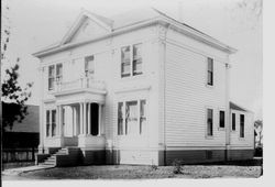Unidentified two story white clapboard house