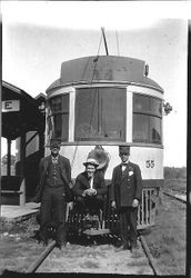 Stan Strout and two conductors in front of electric train No. 55 at the Forestville Station, about 1904