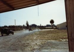 Vintage cars visit the Hallberg Apple Farm roadside stand, October, 1982