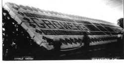 Sebastopol's Gravenstein Apple Show display of boxes of apples that spell out "Growers Union"