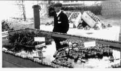 1912 Gravenstein Apple Show display of comparison of the landing of Columbus and present day