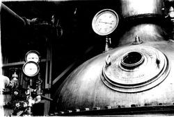 Speas interior with distillery kettle, 1927