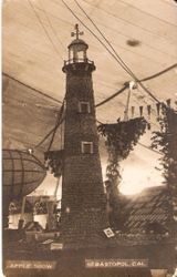 1915 Gravenstein Apple Show display of lighthouse made of whole and dried apples and presented by the Jonive District