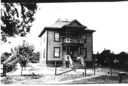 John Gregson on the front porch of the Gregson house on Mill Station Road in Graton in 1910