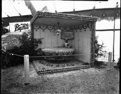 Gravenstein Apple Show, about 1930, with an unidentified display of "Little Jack Horner" made of apples