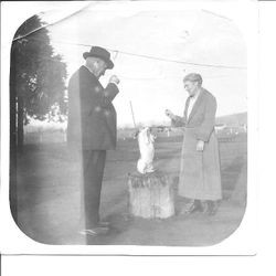 William and Leona Rosebrook and their dog Topsy at their farm on Mill Station Road in Sebastopol on Christmas day, 1920s