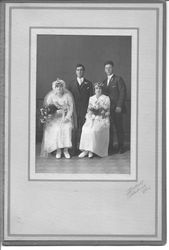 Double wedding studio photo of unidentified couples, about 1920s