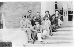 Analy Union High School 1927 yearbook, Azalea, photo of student staff of The Analyan, the bi-monthly school paper, seated on steps of the 'new' Analy gym
