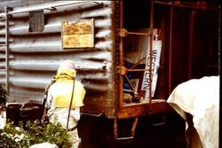 Pacific Fruit Express boxcar being refurbished and sand blasted for the West County Museum at 261 South Main Street in Sebastopol, California, 1995