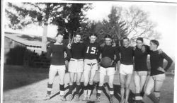 Seven unidentified Analy High School basketball athletes in 1924