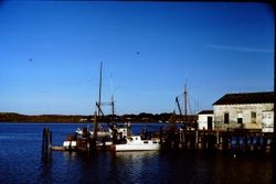 Bodega Bay pier with boat, 1975