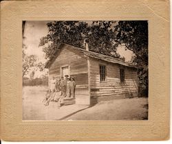 Students and a teacher standing on the front steps of the Summit District School located above Armstrong Grove in 1901