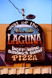 Sign of the West of the Laguna caf, advertising beer, wine, sandwiches and salads, February 1977