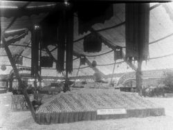 Gravenstein Apple Show display by Spring Hill District showing a steam boat named the "Gravenstein" displayed on a mound of apples