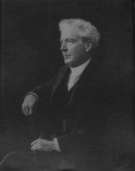 Portrait of Luther Burbank with an embossed picture of a spineless cactus