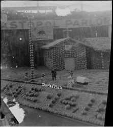 Gravenstein Apple Show exhibit, about 1915 in Sebastopol, showing display of the California Mission in Sonoma and the California Bear flag with "California Republic."