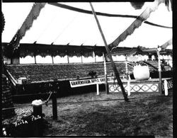 Gravenstein Apple Show, about 1930, showing a display of the Gravenstein Apple Growers Cooperative Association with boxes of apples under the tent