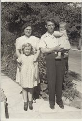 Delbert E Triggs family--wife Georgia, Delbert, Bernice and baby Gloria at J. F. Triggs home at 150 Wallace Street, July, 1941