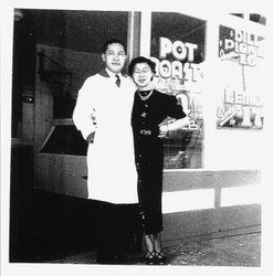 Paul Dunn and friend in front of Paul's Market, Graton, 1930s