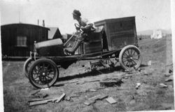 Theodore "Ted" Thomas in a car, about 1920